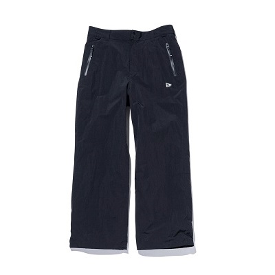 Dark navy outdoor pants with zippered pockets and a small logo on the thigh.