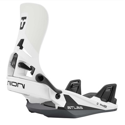 White Atlas snowboard binding with black straps and gray baseplate, mounted for riding