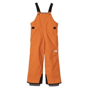 Orange waterproof snow bibs with black adjustable straps and a North Face logo on the leg.