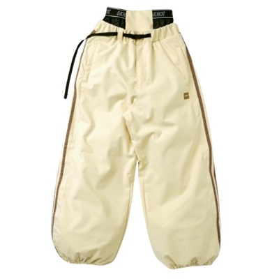 Beige baggy pants with brown side stripes and an elastic, drawstring waist.