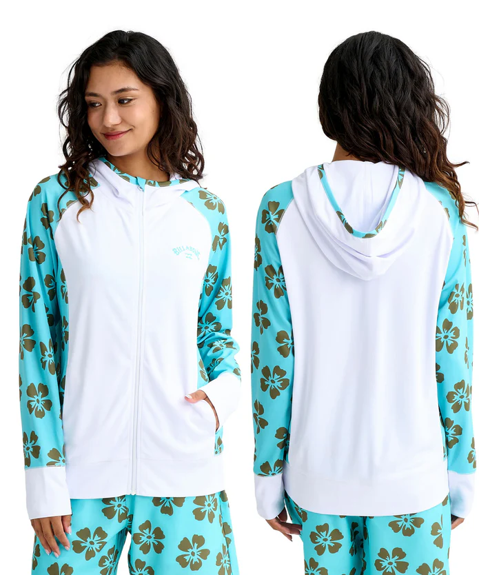 Front and back view of a woman wearing a white zip-front hoodie with turquoise floral sleeves and matching turquoise floral pants; hood visible from the back view.