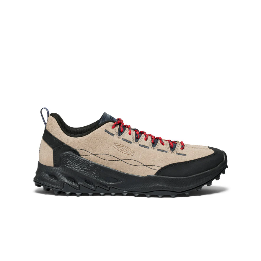Keen hiking shoe in beige with black toe cap and red laces, rugged black sole for outdoor traction
