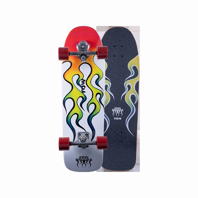 Pair of longboards standing upright: white deck with rainbow flame design and red wheels, beside a dark blue deck with flame graphic.