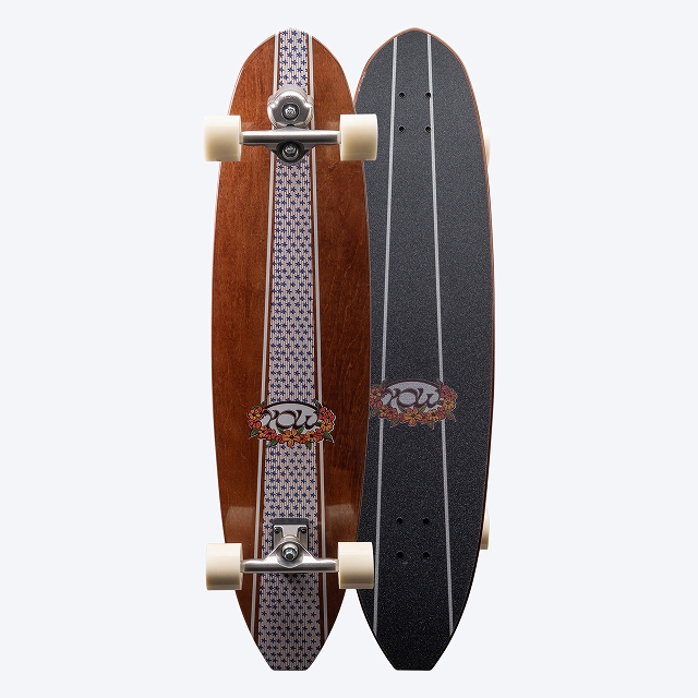 Two longboards displayed side by side: one brown wood deck with decorative striped grip and logo, the other black with grip tape and logo, white wheels