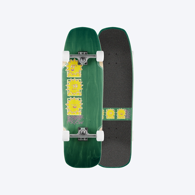Green longboard with yellow sun decals and white wheels, shown from front and side with grip tape visible on the right docked board.