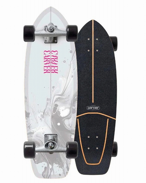 Two longboards side by side: a white marbled deck with pink graphic and a black deck with orange grip outlines (Carver logo visible).