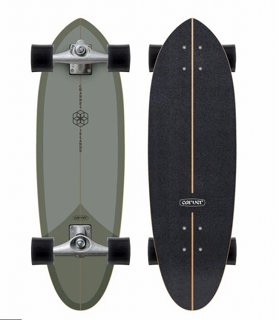Two longboards shown from the top: one gray-green with trucks and wheels, the other black with a light wood stringer and Carver logo.