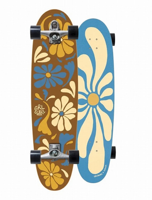 Two longboards with floral prints standing side by side: brown board with colorful flowers and a blue board with large cream flowers, trucks and wheels visible.