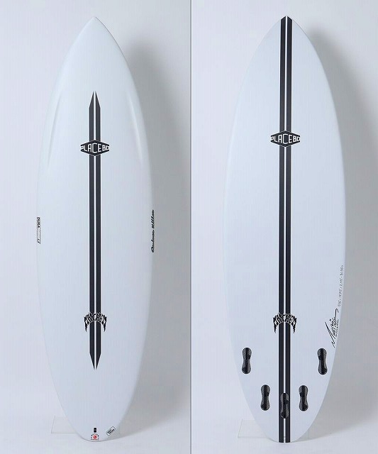 Two white surfboards standing upright against a light background, each with a bold black center stringer and branding; the left board has a single-fin setup, the right board has four fin boxes for a quad fin setup.