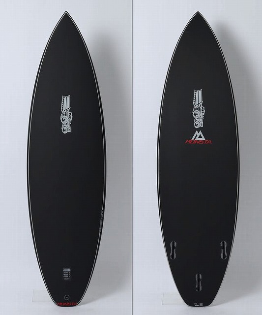 Two black surfboards with white rails, displayed upright side by side against a light background; left board has a silver logo, right board shows a silver logo with a red brand mark and tail fin plugs.