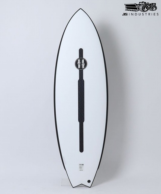 White surfboard with black edging and a centered black traction pad, JS Industries logo visible in the top-right corner of the image.