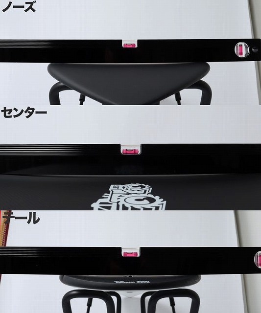 Close-up of white label strips with black bars and pink tabs, showing Japanese labels ノーズ, センター, テール.