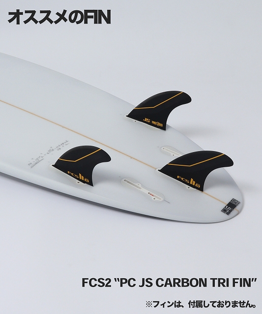 White surfboard with three black carbon tri-fin fins installed; Japanese text 'オススメのFIN' at the top and caption 'FCS2 “PC JS CARBON TRI FIN”' along the bottom.
