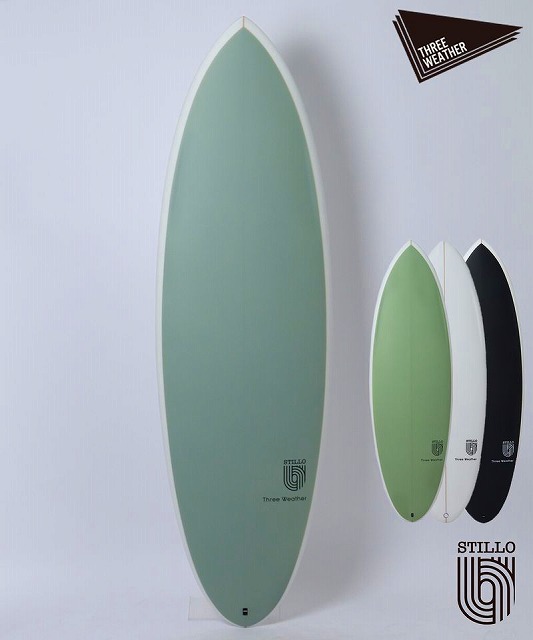 a-SYfVVWTw - SHOP NEWS | ムラサキスポーツオンラインストア 通販 Four surfboards in pastel green, white, and black arranged against a pale wall, largest board in the foreground with brand logos nearby.