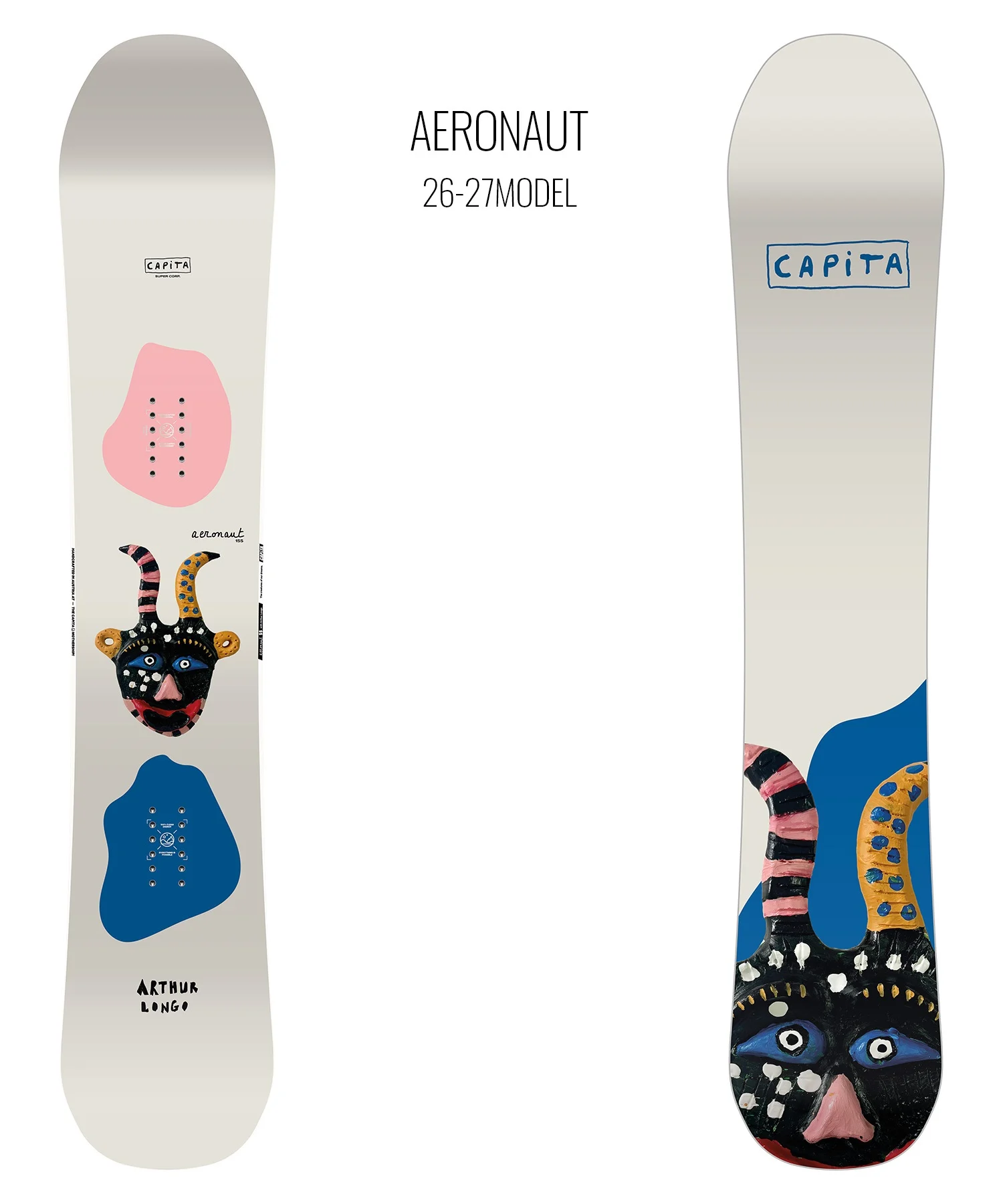 Two Capita Aeronaut snowboards (26–27 model): left board with a pink abstract shape and a colorful masked figure; right board shows the Capita logo and bottom mask art with blue shapes.