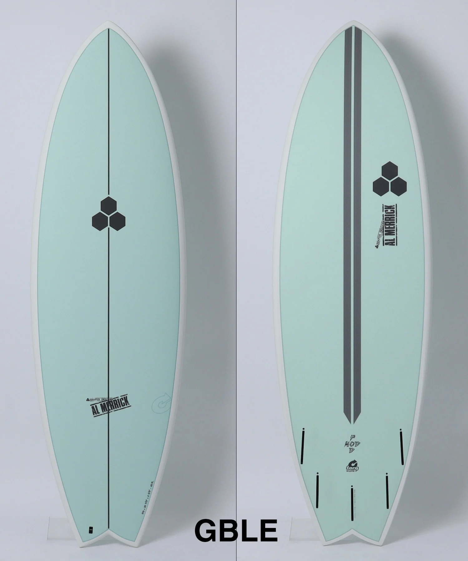 Two mint-green surfboards shown side by side, each with a central black line and small hexagon logo; left board plain, right board with logos along center.