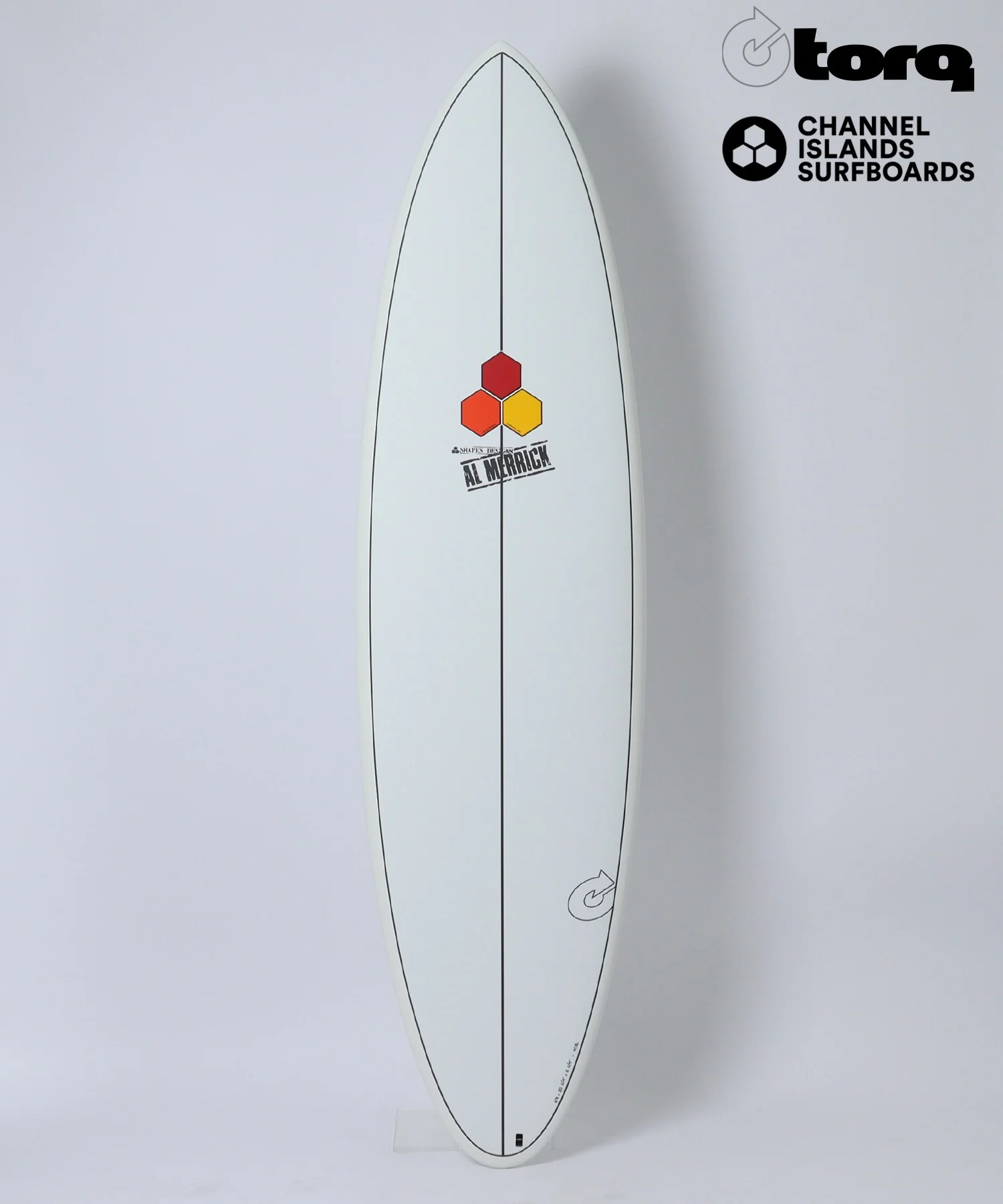 White surfboard standing upright with black narrowing stringers and three hexagon logos in red, orange, yellow near the center; brand logos in the top right corner (Torq, Channel Islands Surfboards).