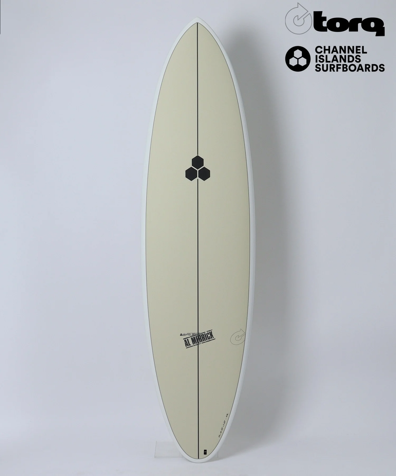 Beige surfboard standing upright with a black center stringer and a small hexagon emblem in the middle; Torq and Channel Islands Surfboards logos appear in the upper right corner.