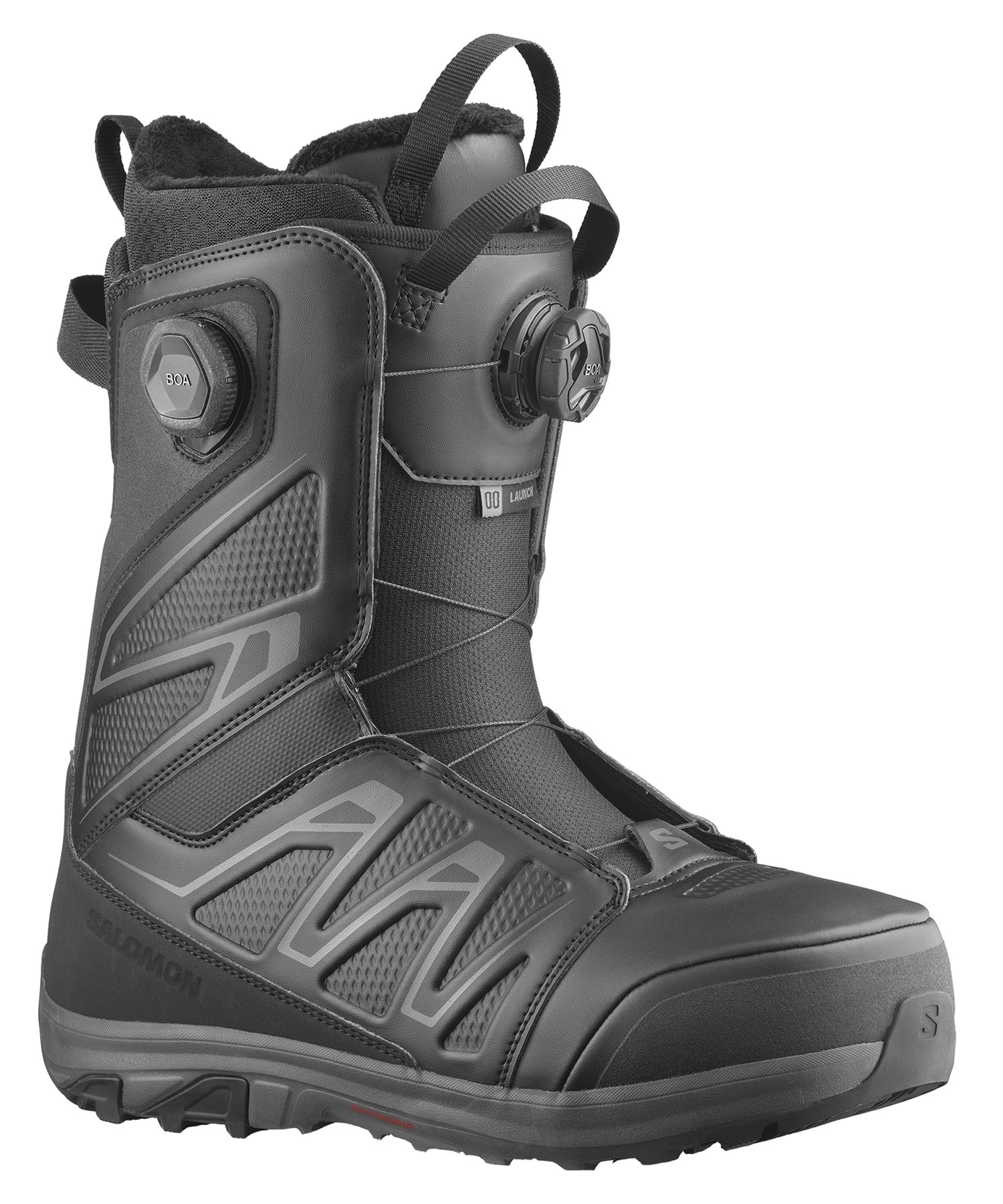 Close-up of a black snowboard boot showing a BOA dial and strap closures for tightening, with rugged textured panels and a chunky tread sole.