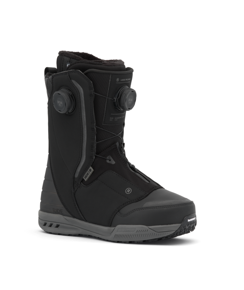 Black snowboard boot with a dual BOA dial lacing system and padded interior, rugged outsole for grip.