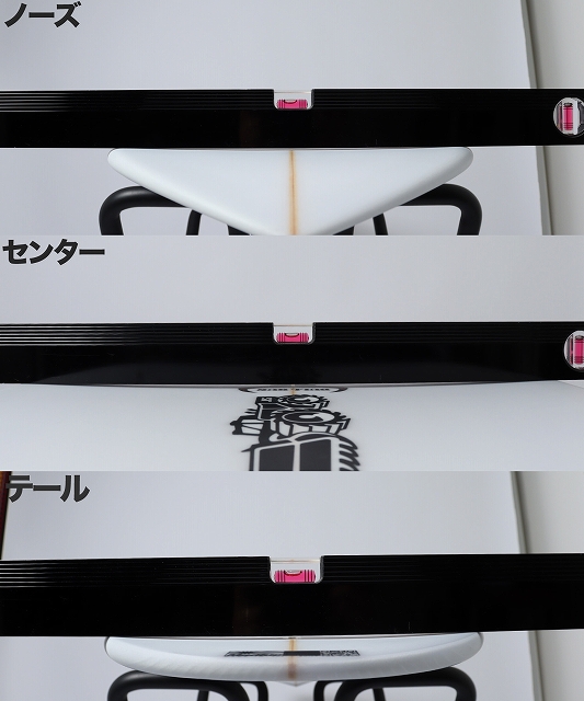 Close-up of a surfboard shown in three labeled sections: nose (ノーズ), center (センター), and tail (テール) with black rails and pink fasteners.