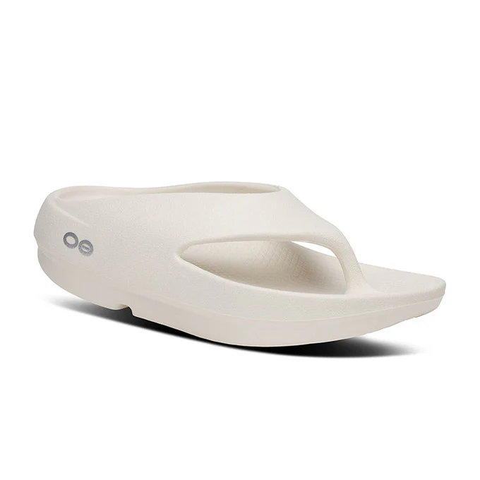 White foam flip-flop sandal with a toe thong and contoured sole for comfort