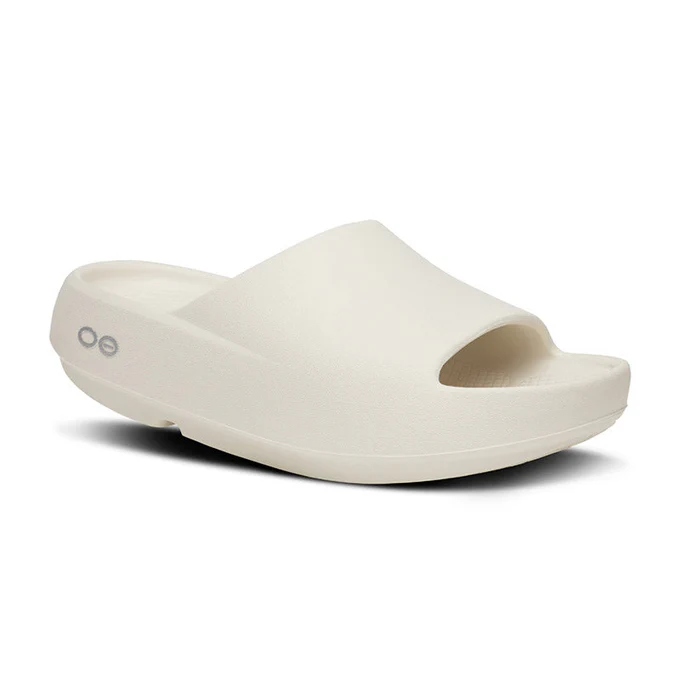 White platform slide sandal with a single wide strap and contoured footbed.