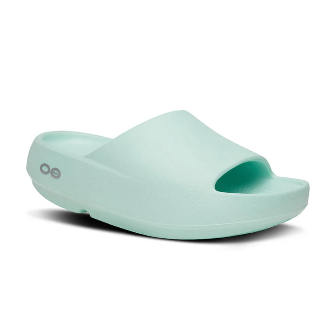 Mint green platform slide sandal with a single wide strap and open toe.