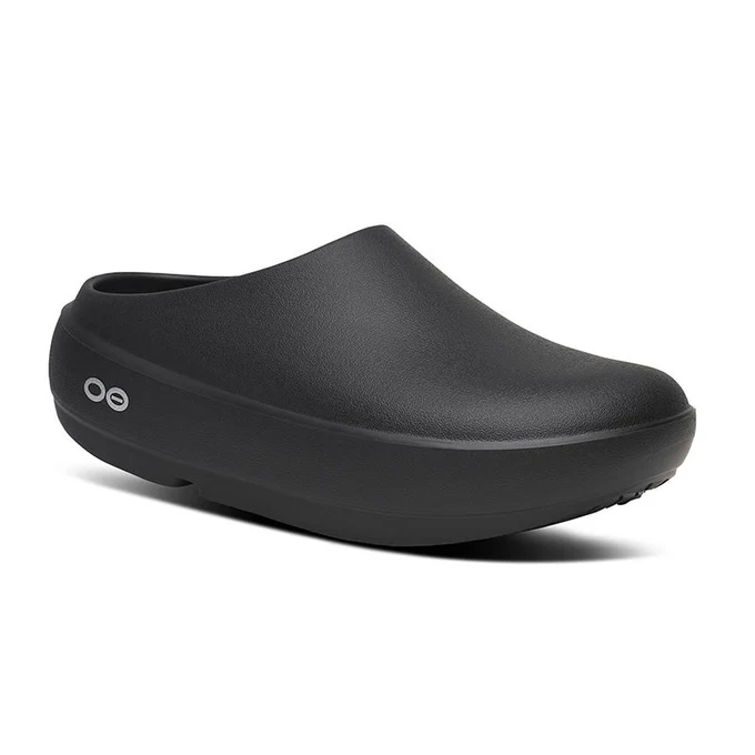 Black slip-on clog with a thick platform sole and rounded toe, side view.