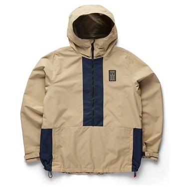 Beige hooded windbreaker with a dark blue center panel, navy side pockets, and a chest logo patch.