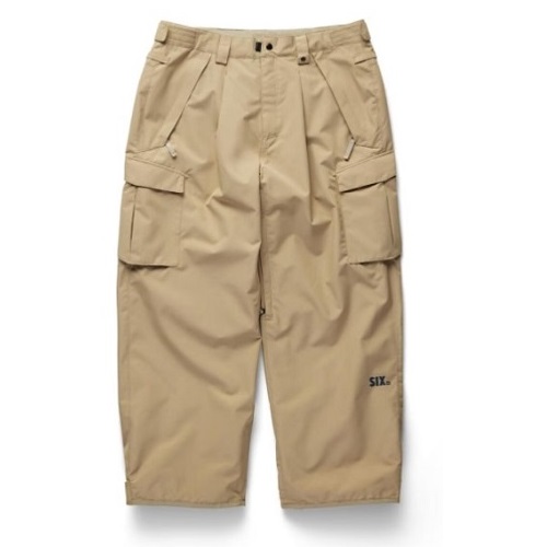 Beige knee-length cargo shorts with multiple side pockets and a small SIX logo on the lower right leg.