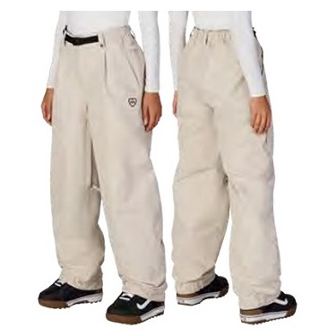 Two people wearing beige baggy snow pants with belts and sneakers.