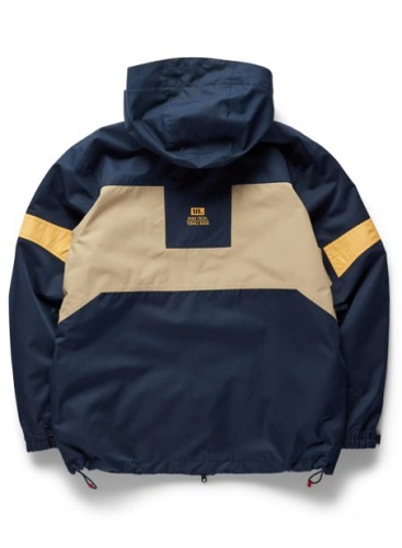 Back view of a navy windbreaker with a beige horizontal panel across the upper back, yellow sleeve stripes, a hood, and a drawstring hem.