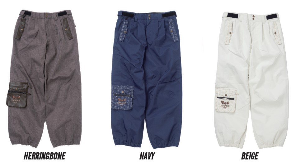 Three cargo pants on white background: herringbone gray, navy, and beige styles, each with large front pockets and zippered/velcro side pockets on the legs.