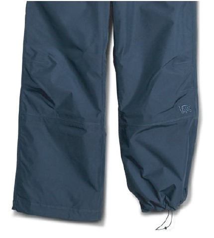 Navy blue rain pants with elastic cuffs and a drawstring hem, Vans logo on the right leg.