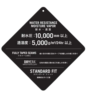 Diamond-shaped black garment tag listing water resistance 10,000 mm, breathability 5,000 g/m²/24h, fully taped seams, dryer safe, and standard fit.