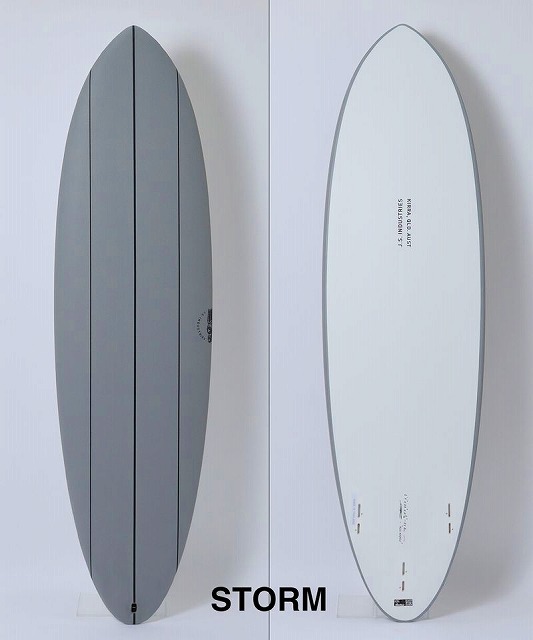 Two views of a Storm surfboard: gray top deck with a dark center stringer on the left, white bottom with logos on the right.