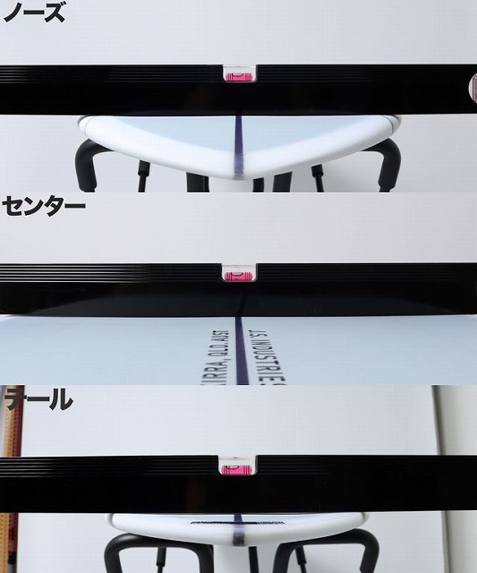 Close-up of a white ergonomic chair seen through black horizontal slats with pink clips; Japanese labels 'Nose', 'Center', 'Tail' on the left.