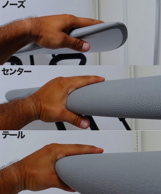 Hand pressing a gray textured foam pad at three sections labeled Nose, Center, and Tail.
