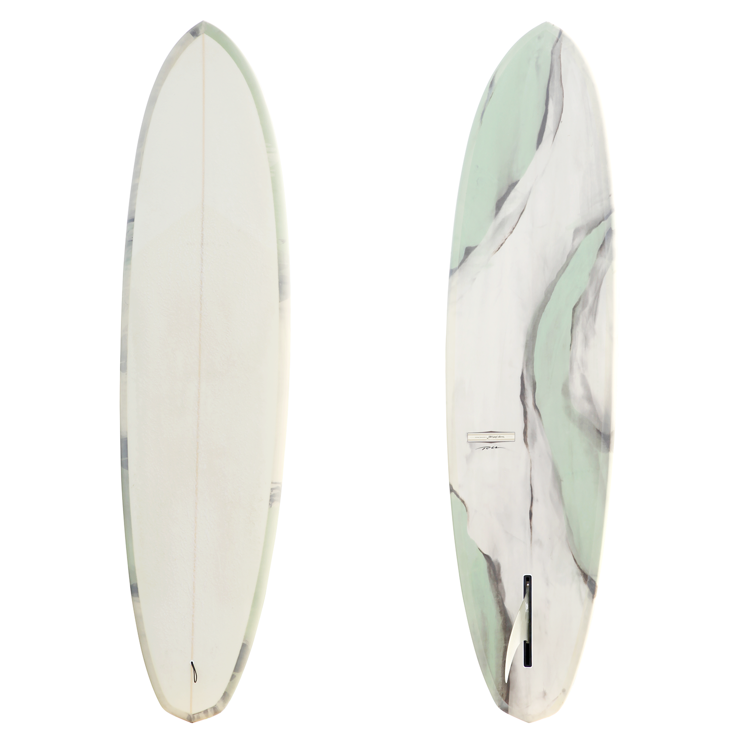 Two surfboards standing upright side by side; left board is plain white, right board has a green and white marbled pattern with darker streaks.