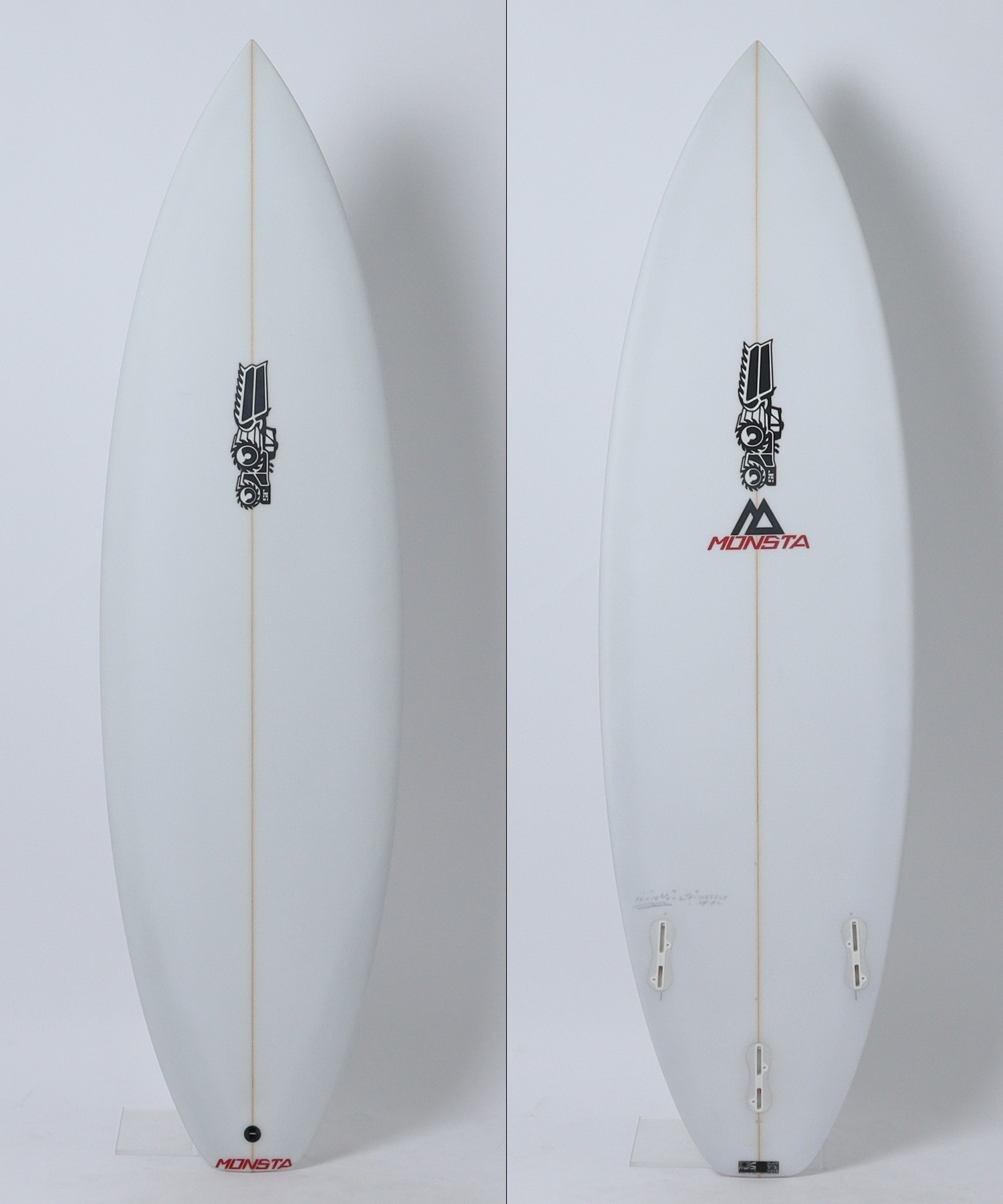 Front view of a white surfboard with a beige stringer, featuring a small black graphic logo midboard and the MONSTA logo near the tail on a light background (left panel). The board is oriented vertically with a rounded nose and single fin slot visible.