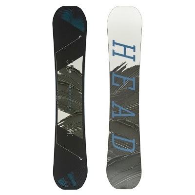 Pair of snowboards side by side; left board is black with teal and white geometric graphic, right board is white with large blue 'HEAD' text.