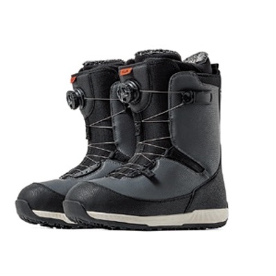 Pair of black snowboard boots with white soles, shown side by side.