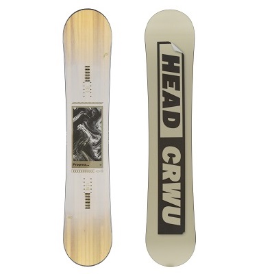 Two snowboards standing upright side by side; left board has a wood-grain top and bottom with a central graphic, right board is beige with bold vertical text along its length.