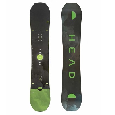 Two snowboards shown side by side, black with green accents; left board has a lime-green bottom and central circular pad pattern, right board features a dark camo-like design with bright green lettering along its length.
